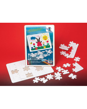 Biely kartón s vyseknutými tvarmi puzzle